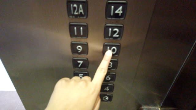 A finger press 10th floor and close button of elevator